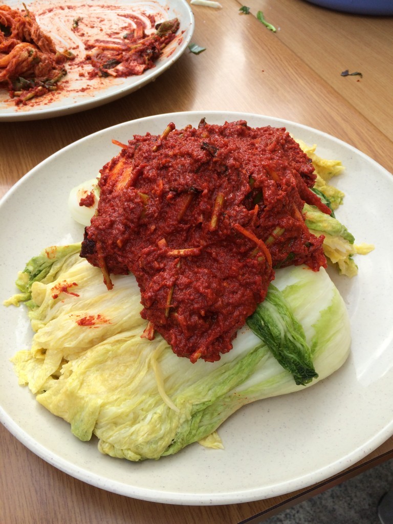 kimchi sauce on lettuce